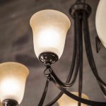 metal-framed kitchen chandelier with glass sconce lights